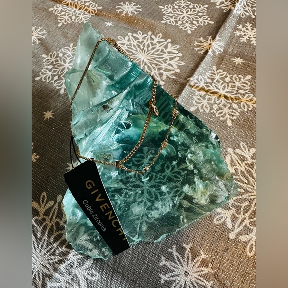 Givenchy Bracelet NWOT as it felll off.  Cubic Zirconia and Gold. Sliding sizer - Picture 2 of 5